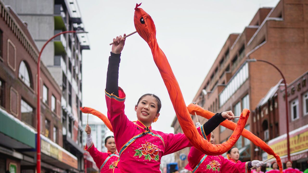 Dancers perform during the annual Spring Festival Parade through Chinatown for the Lunar New Year in Vancouve