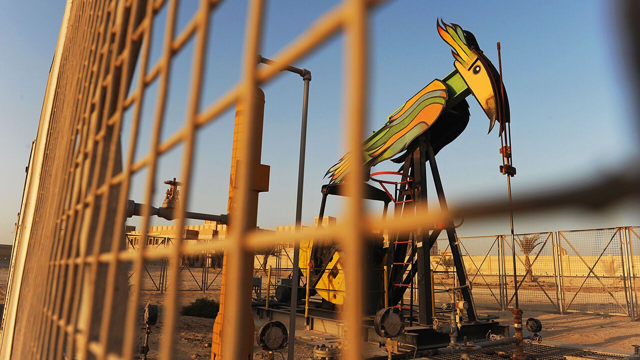 An oil pump operates at the Bahrain Petroleum Company (BAPCO) run oil field in Awali, Bahrain.